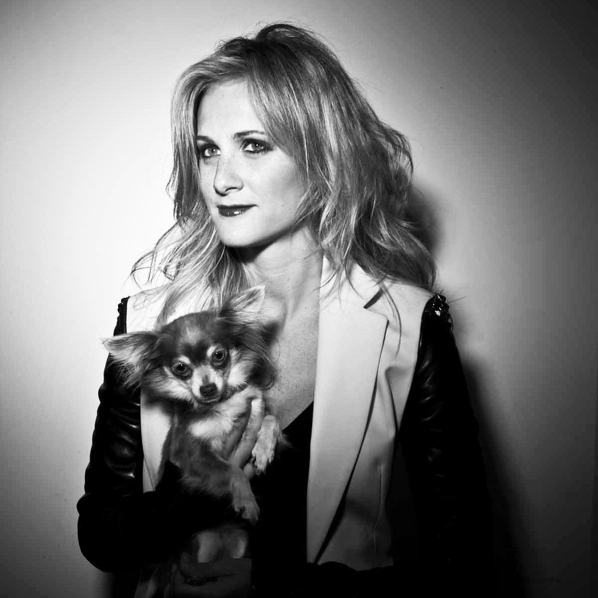 Lauren Blitzer 25 years ago, holding her dog